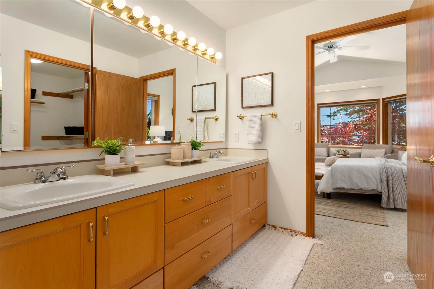 6404 Warren Street Anacortes, WA 98221 - Photo 23 of 38 a en suite bathroom with double sink and a mirror