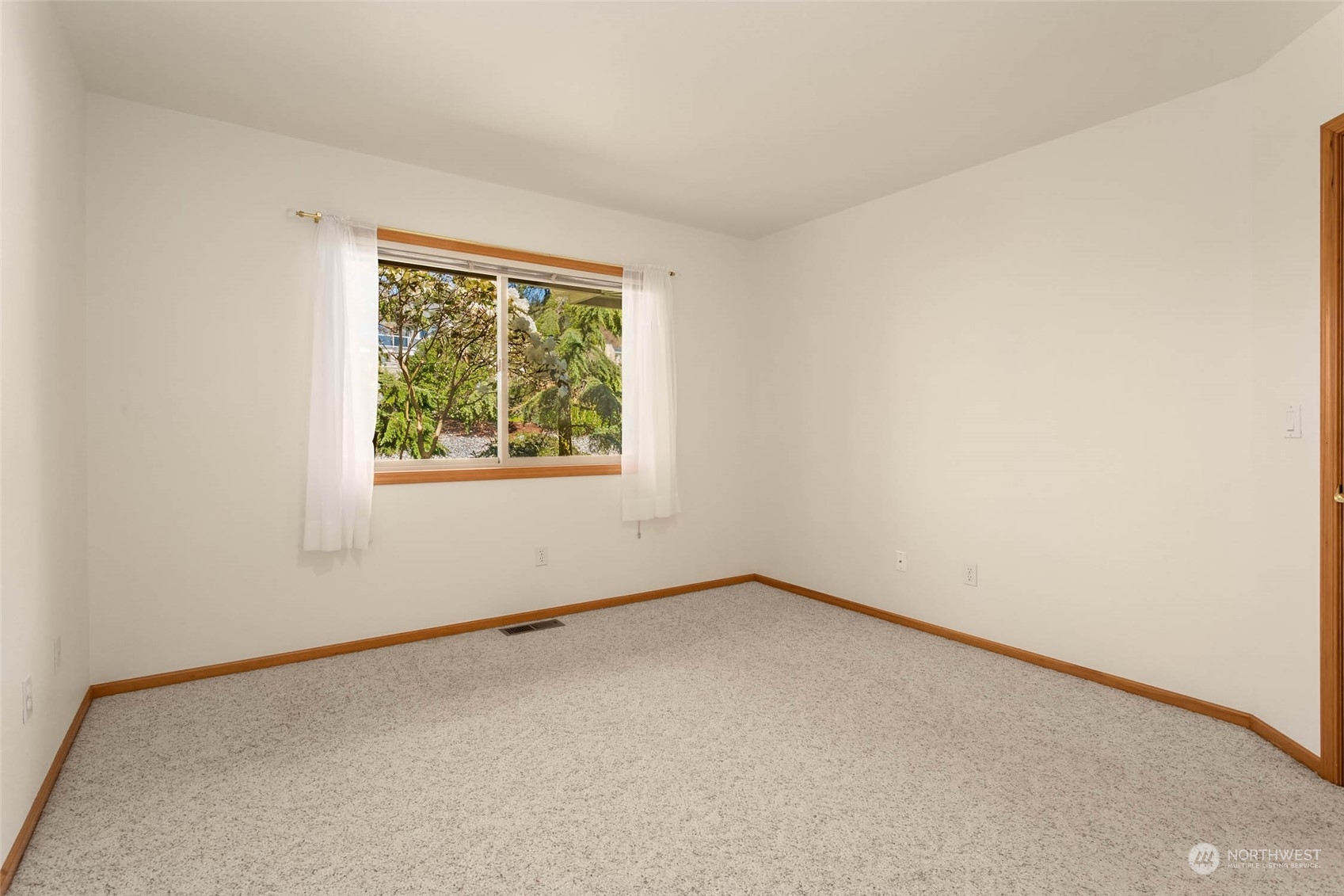 6404 Warren Street Anacortes, WA 98221 - Photo 28 of 38 an empty room with a window