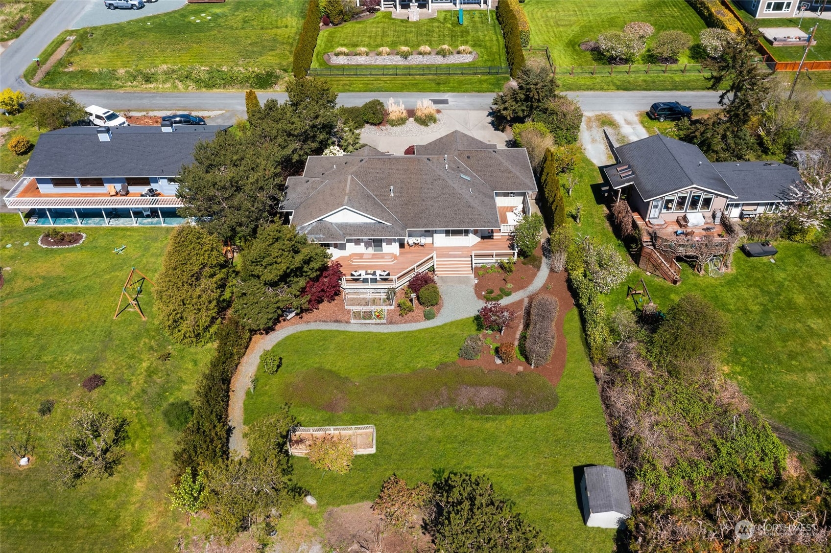 6404 Warren Street Anacortes, WA 98221 - Photo 36 of 38 an aerial view of a house with a garden