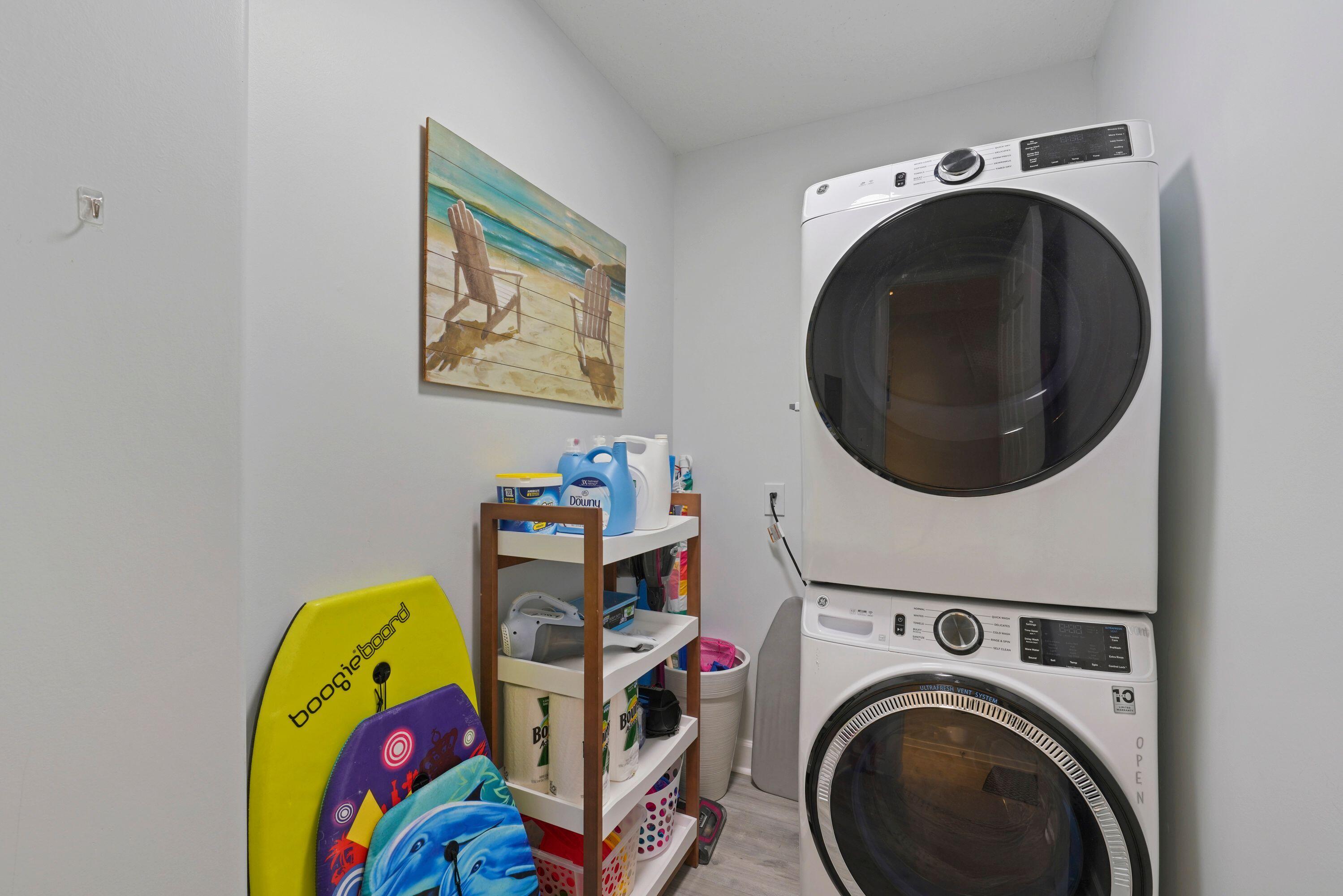 14415 Front Beach Road, Unit 2007 Panama City Beach, FL 32413 - Photo 21 of 26 a utility room with dryer and washer
