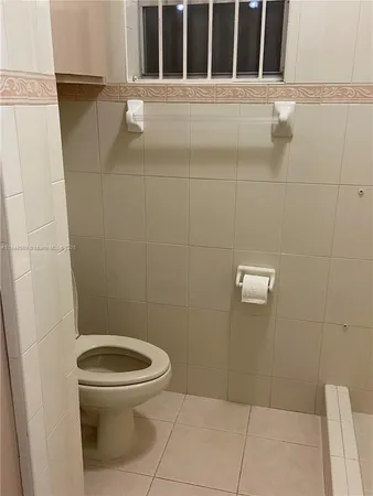 a bathroom with a toilet