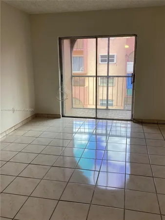 a room with a black white checkered floor