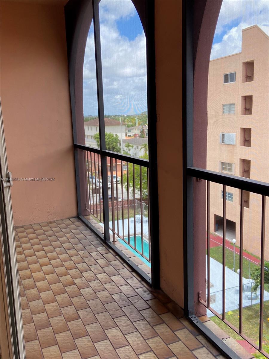 440 East 23rd Street, Unit 1416 Hialeah, FL 33013 - Photo 10 of 13 a view of a black and white floor to ceiling window