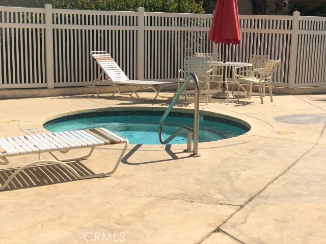 200 East Racquet Club Road, Unit 19 Palm Springs, CA 92262 - Photo 19 of 21 a terrace with water view