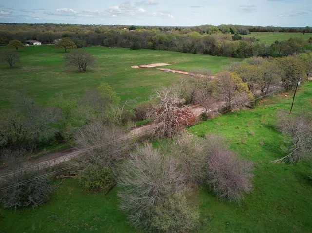 a view of a lake with a city