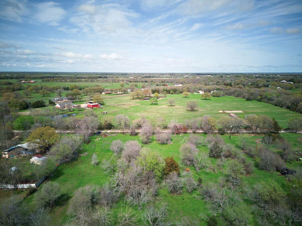 18579 Cr 4061 Road Scurry, TX 75158 - Photo 29 of 33 a view of a green field with lots of trees
