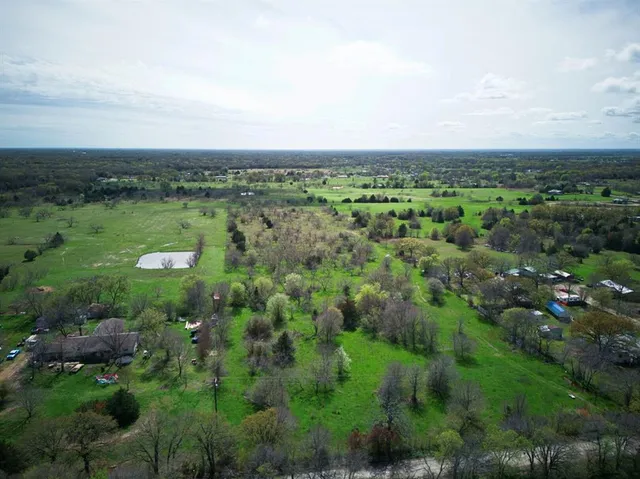 an aerial view of a city with lots of residential buildings