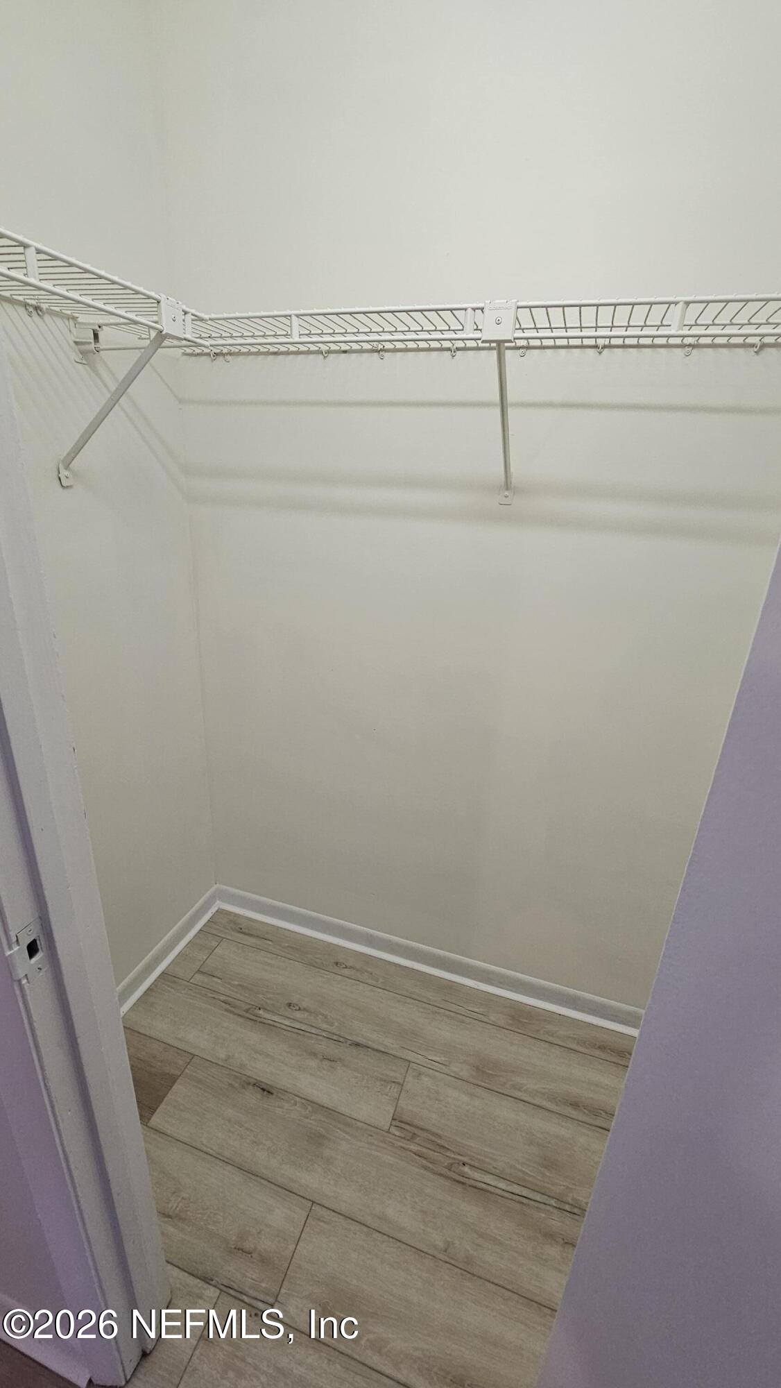 820 Orchid Street Atlantic Beach, FL 32233 - Photo 21 of 27 a view of a room with racks on the wall