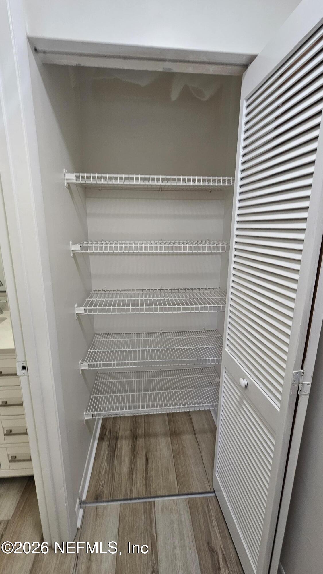 820 Orchid Street Atlantic Beach, FL 32233 - Photo 24 of 27 a view of walk in closet