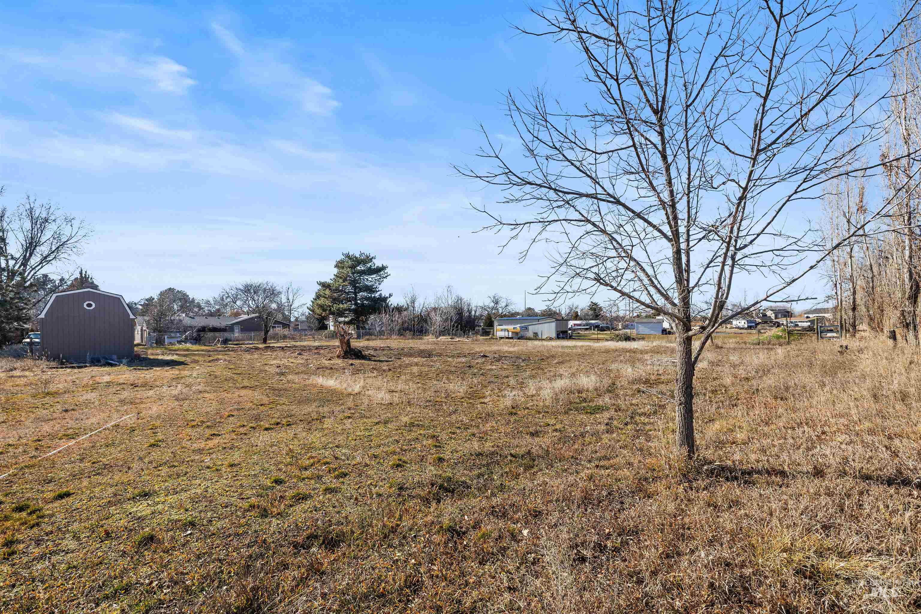3154 South McCormick Way Boise, ID 83709 - Photo 43 of 50 View of yard with a storage shed