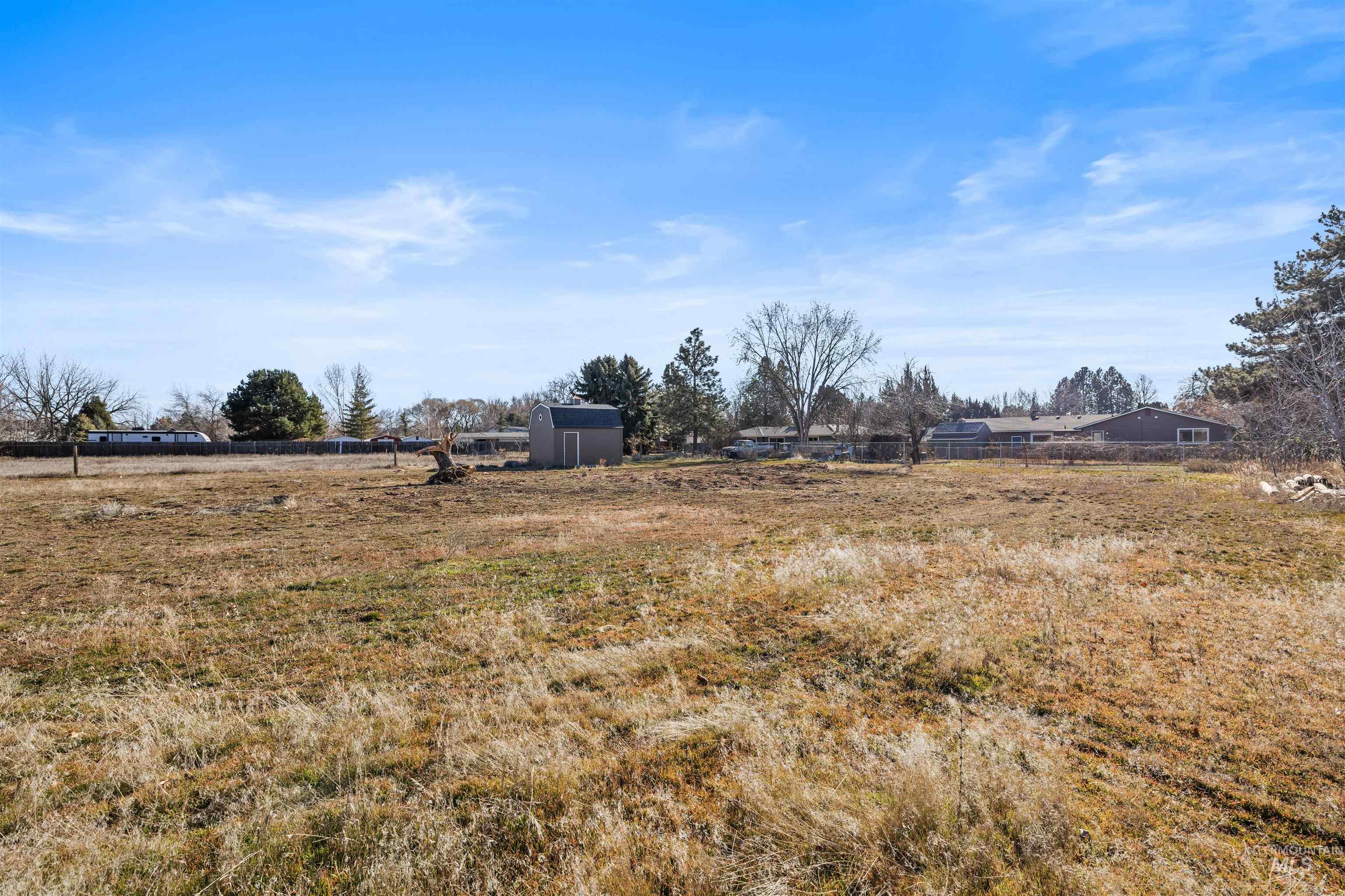 3154 South McCormick Way Boise, ID 83709 - Photo 44 of 50 View of yard featuring a storage unit