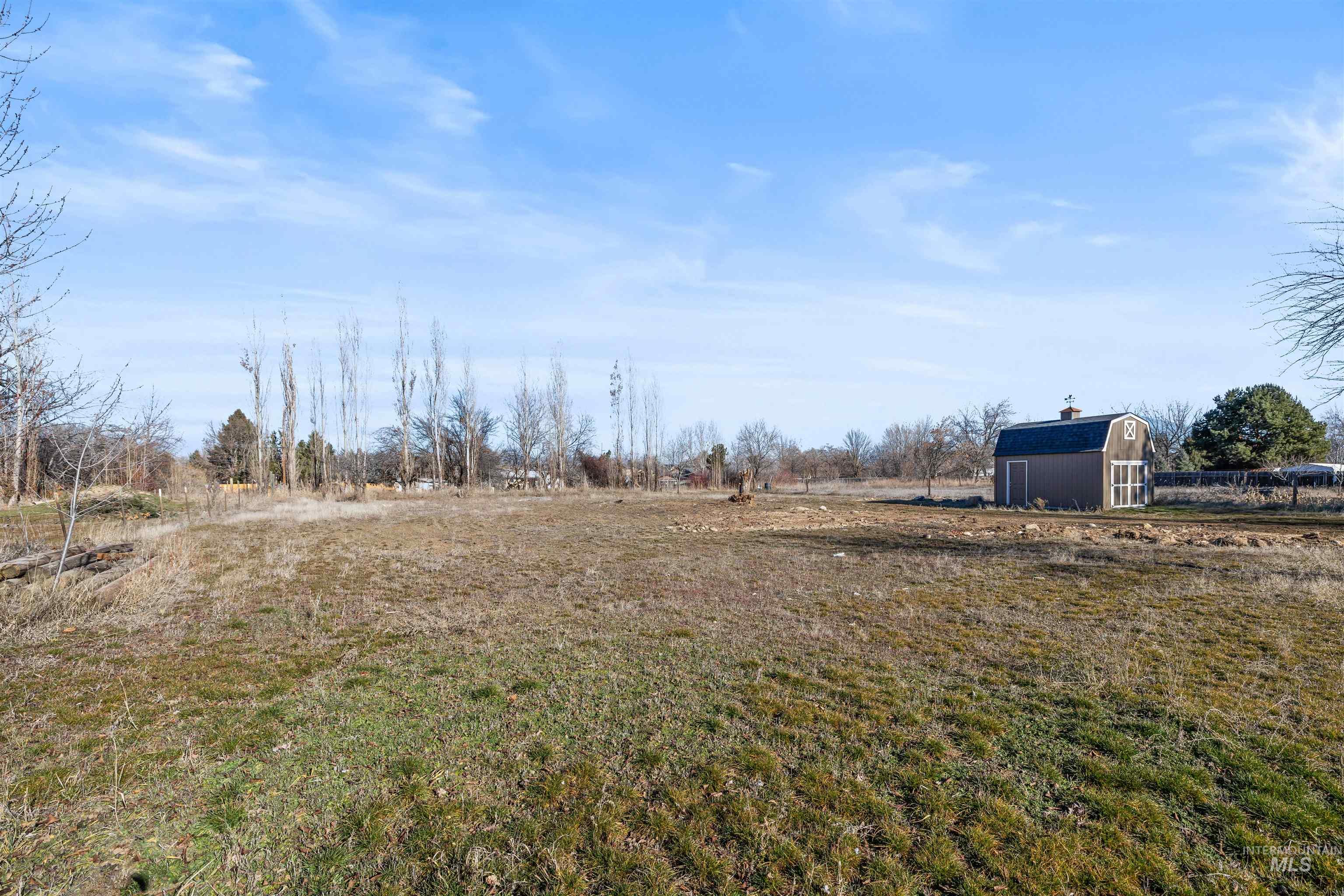 3154 South McCormick Way Boise, ID 83709 - Photo 45 of 50 View of yard with a shed and a view of countryside