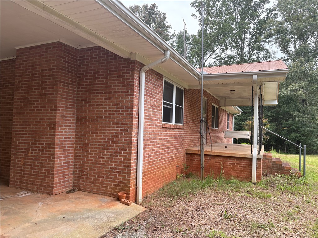 590 Stamp Creek Road Salem, SC 29676 - Photo 3 of 10 Carport with only two steps into the home.