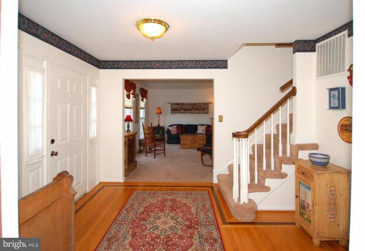 4416 Rendale Court Olney, MD 20832 - Photo 2 of 28 a view of living room and wooden floor