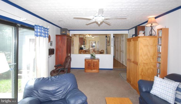 4416 Rendale Court Olney, MD 20832 - Photo 12 of 28 a living room with furniture and a large window