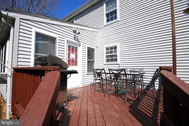 4416 Rendale Court Olney, MD 20832 - Photo 22 of 28 a view of balcony deck and patio