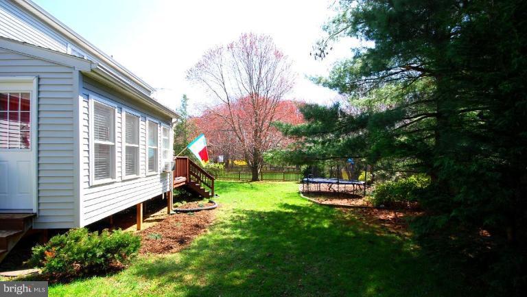4416 Rendale Court Olney, MD 20832 - Photo 23 of 28 a garden view with a seating space