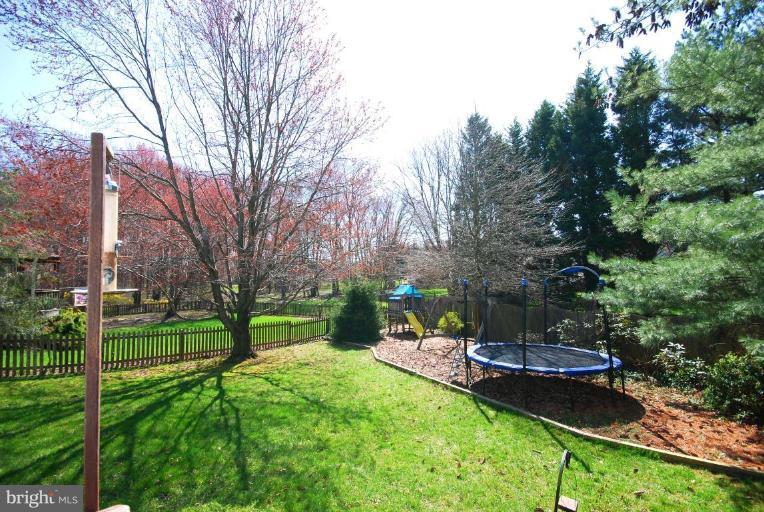 4416 Rendale Court Olney, MD 20832 - Photo 24 of 28 a view of a park with large trees