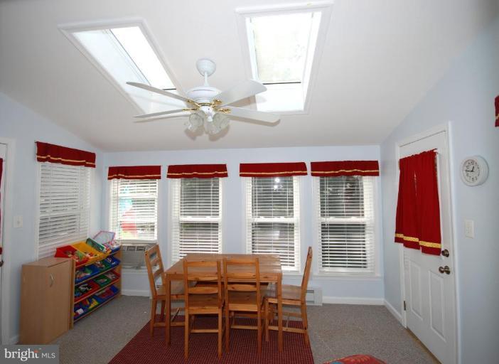 4416 Rendale Court Olney, MD 20832 - Photo 10 of 28 a dining room with furniture and window