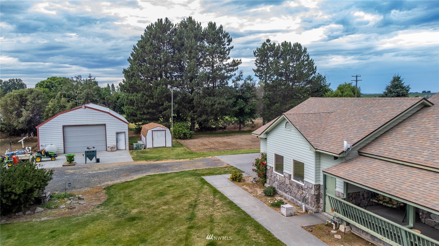 1659 West Gillis Road Othello, WA 99344 - Photo 3 of 38 a view of a house with a yard