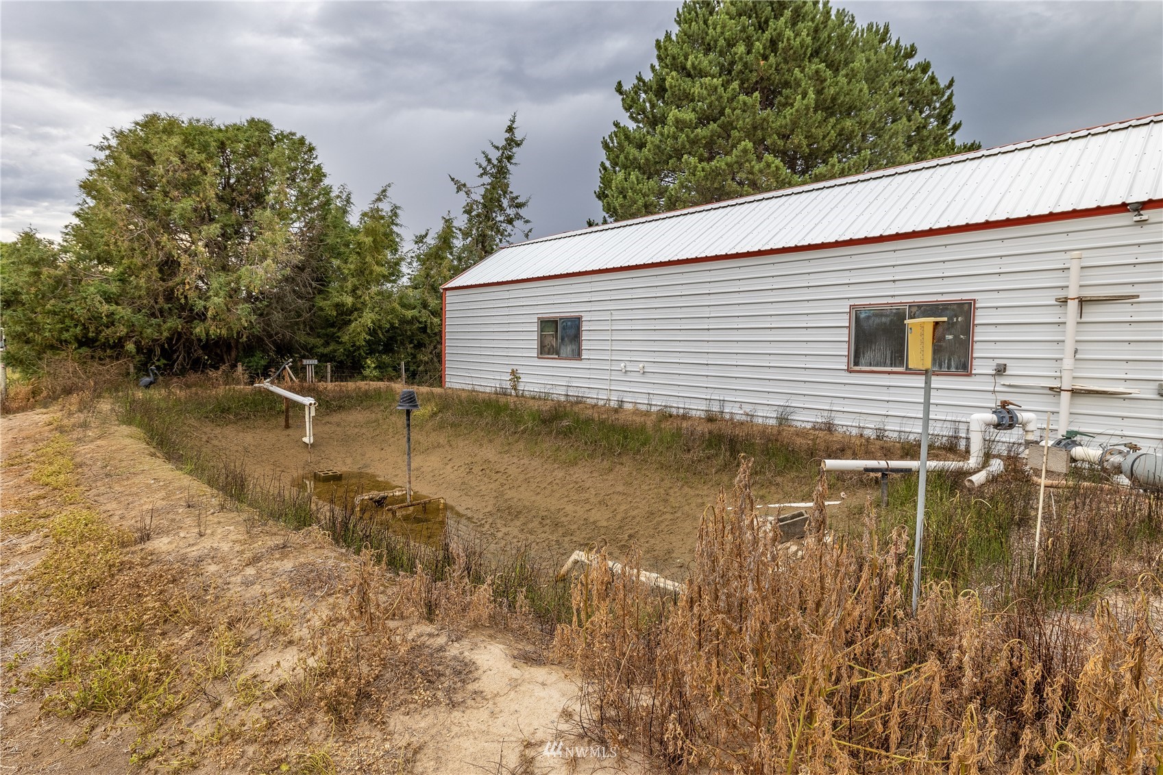 1659 West Gillis Road Othello, WA 99344 - Photo 31 of 38 a view of a house with a yard
