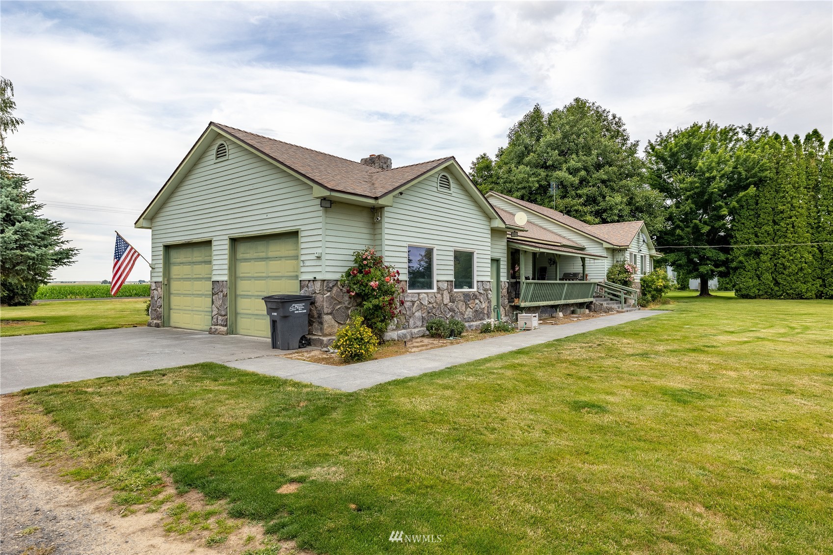 1659 West Gillis Road Othello, WA 99344 - Photo 37 of 38 a front view of house with yard patio and green space