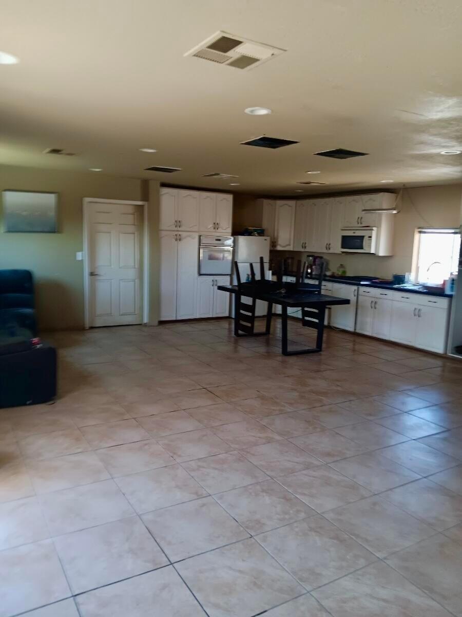 20025 Chamisal Street Adelanto, CA 92301 - Photo 25 of 46 a view of a kitchen and a window