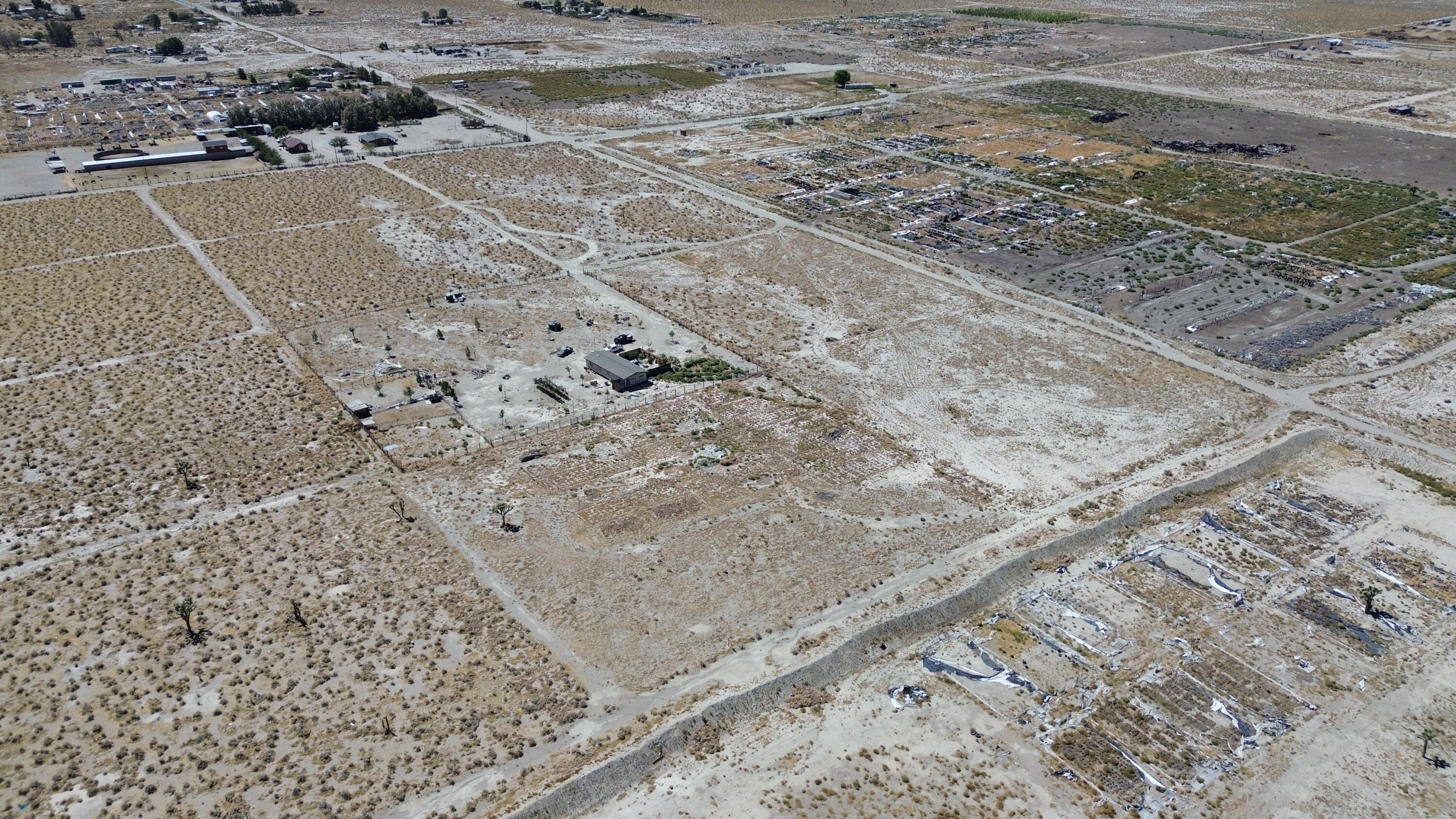 20025 Chamisal Street Adelanto, CA 92301 - Photo 37 of 46 a view of a dry yard with wooden fence