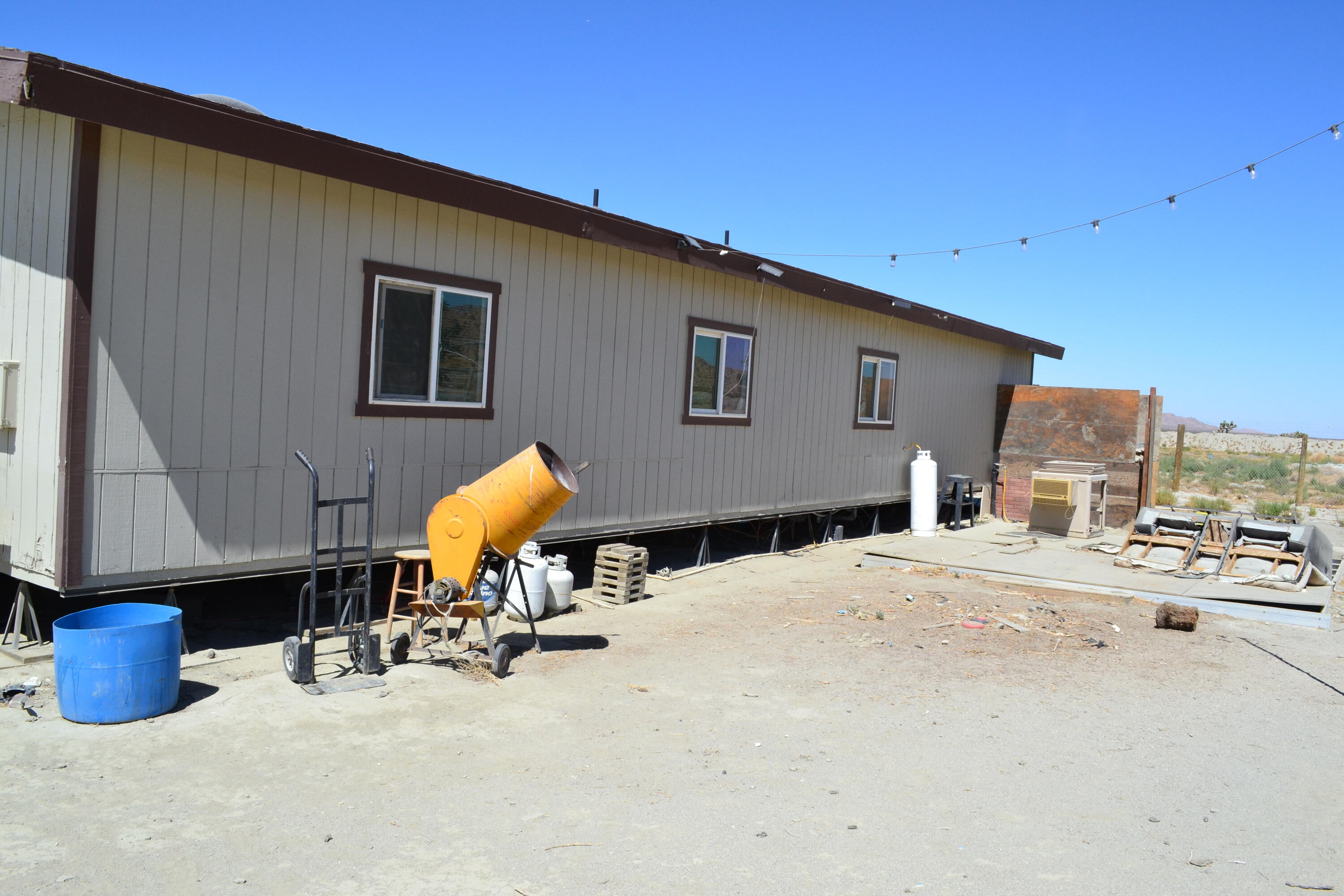 20025 Chamisal Street Adelanto, CA 92301 - Photo 5 of 46 a house view with a outdoor space