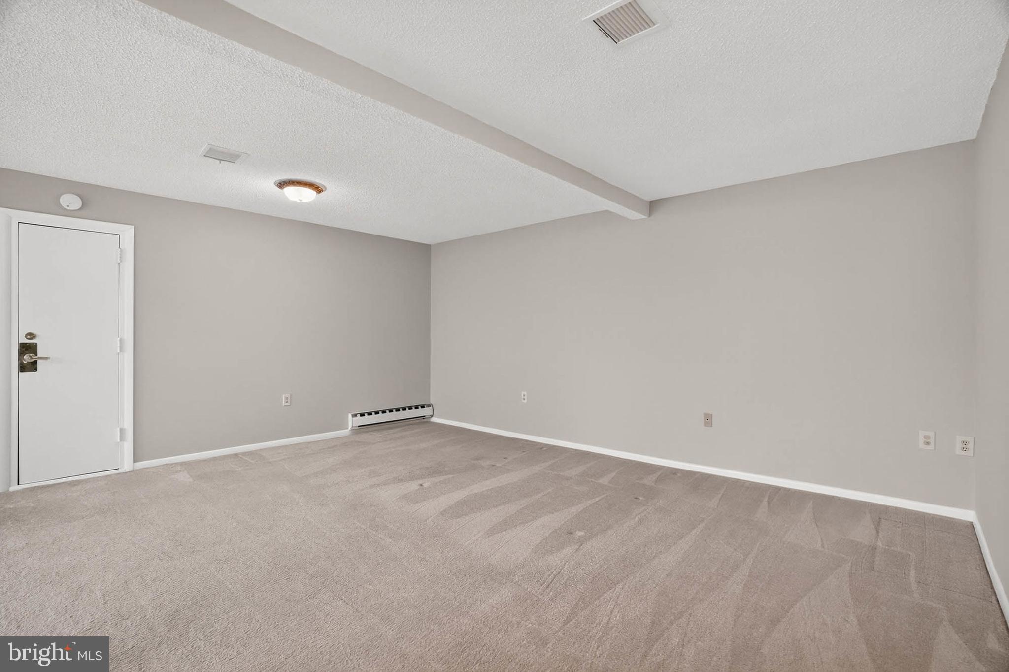 3416 Island Creek Court, Unit 127C Silver Spring, MD 20906 - Photo 18 of 60 a view of an empty room
