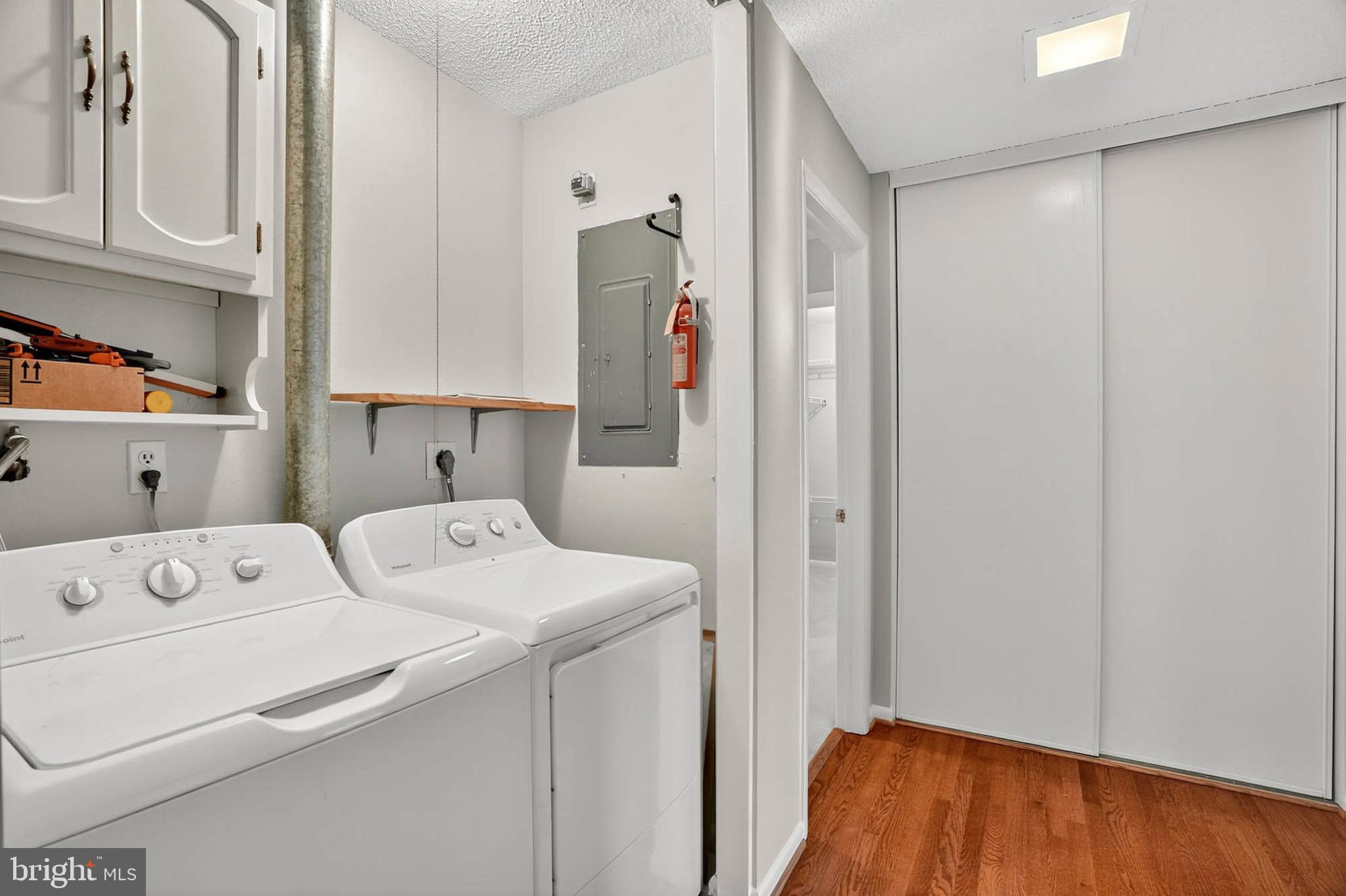 3416 Island Creek Court, Unit 127C Silver Spring, MD 20906 - Photo 27 of 60 a utility room with dryer and washer