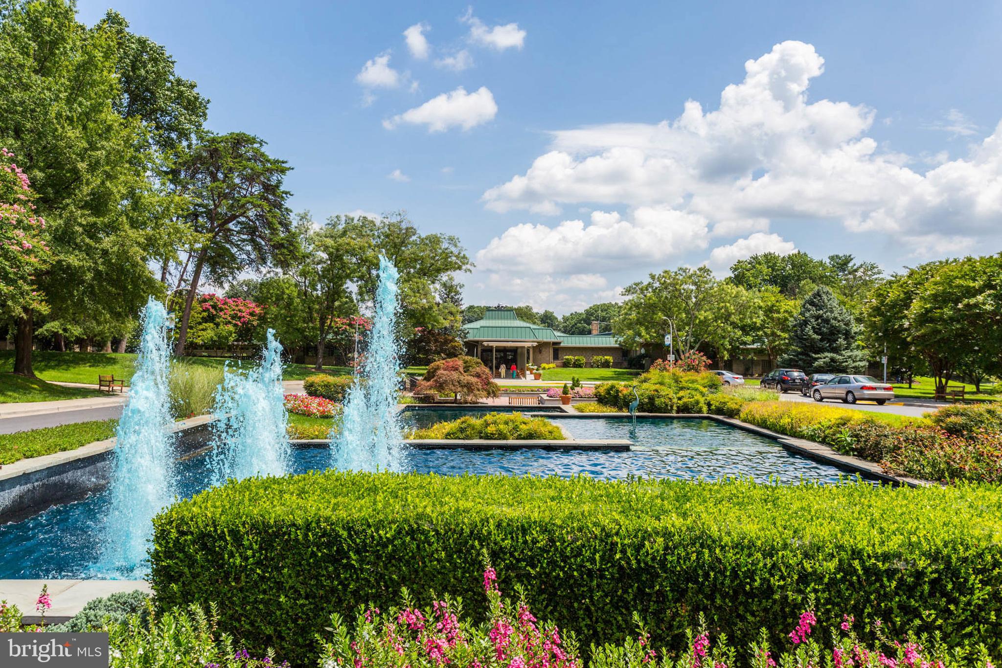 3416 Island Creek Court, Unit 127C Silver Spring, MD 20906 - Photo 36 of 60 a view of a house with swimming pool and yard