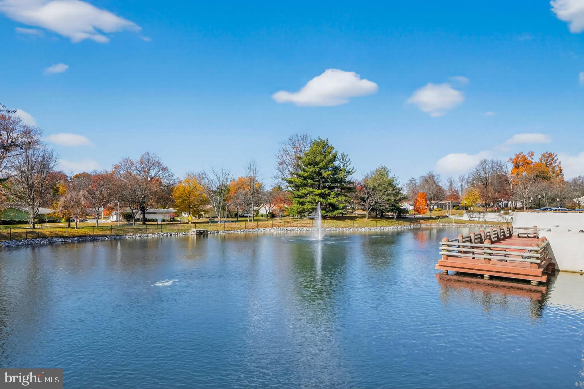 3416 Island Creek Court, Unit 127C Silver Spring, MD 20906 - Photo 52 of 60 a view of a lake with houses