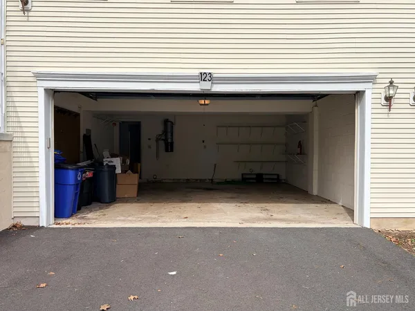 a view of a house with a garage