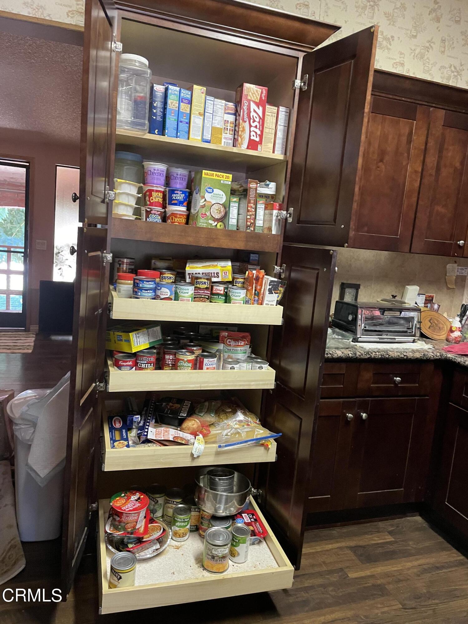 8855 Reche Canyon Road Colton, CA 92324 - Photo 16 of 19 8855 Reche Canyon Rd Pantry Cabinet