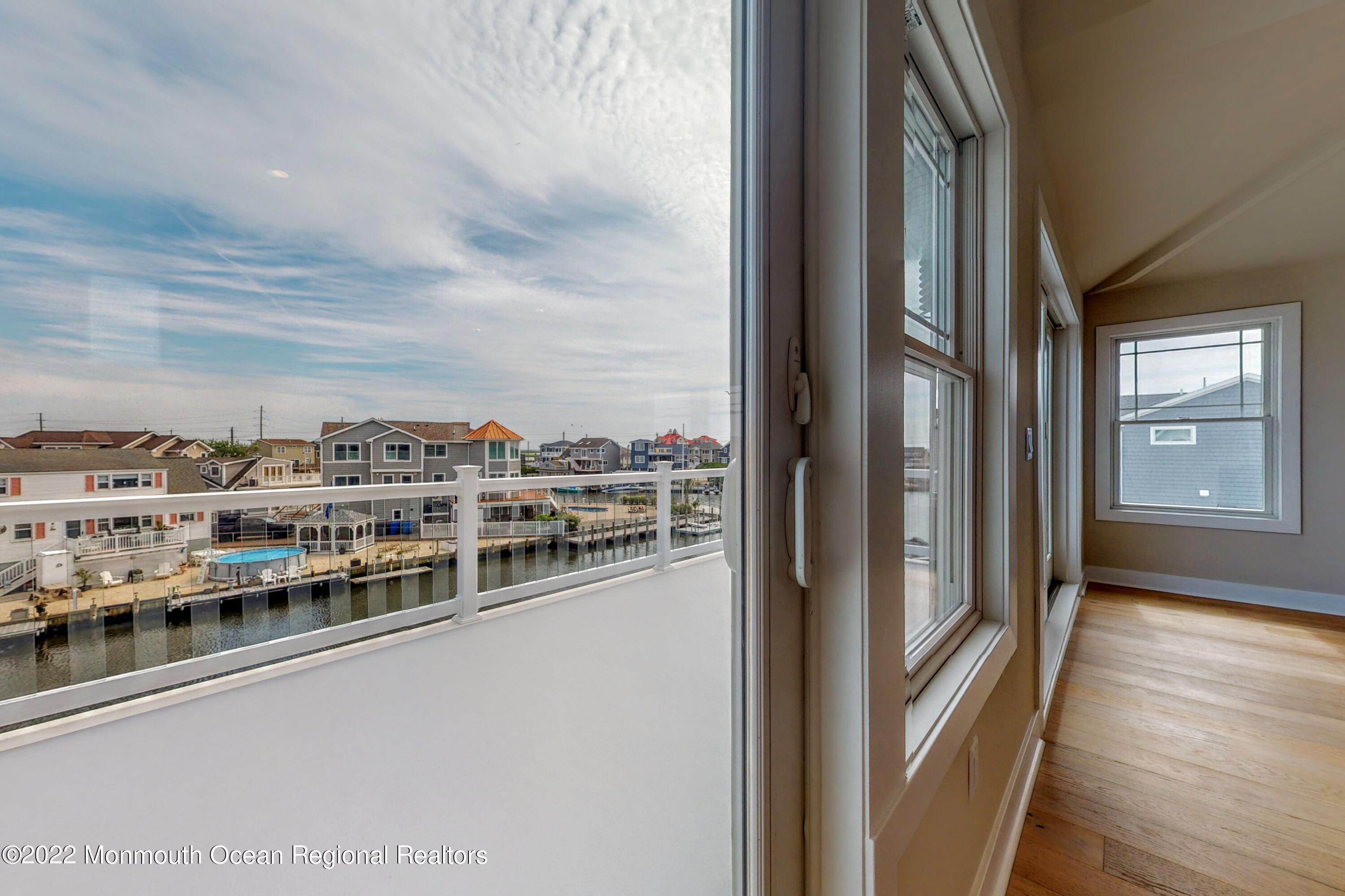 48 Muriel Drive Manahawkin, NJ 08050 - Photo 13 of 89 a view of a city from a balcony