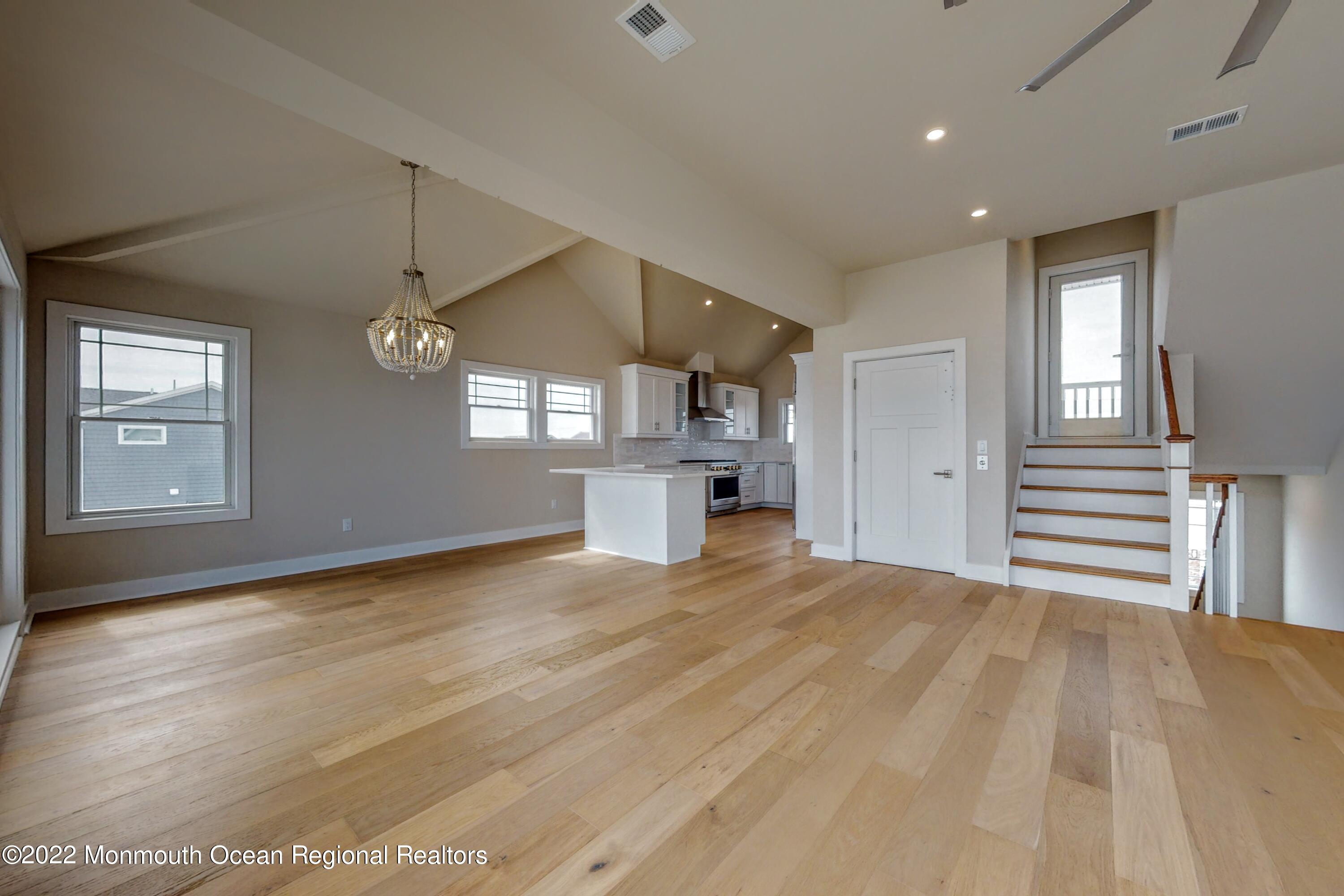 48 Muriel Drive Manahawkin, NJ 08050 - Photo 14 of 89 a view of empty room with wooden floor and window