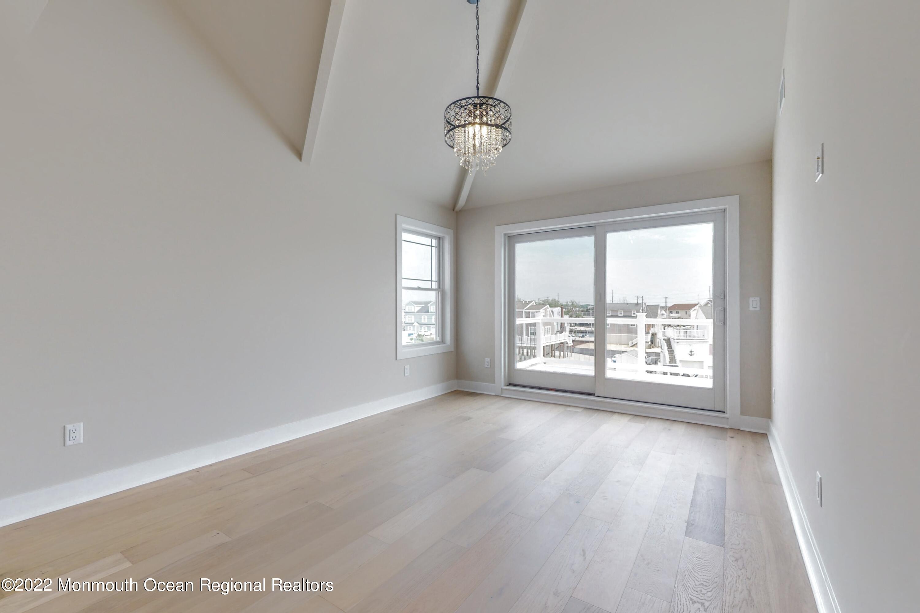 48 Muriel Drive Manahawkin, NJ 08050 - Photo 31 of 89 a view of an empty room with a window