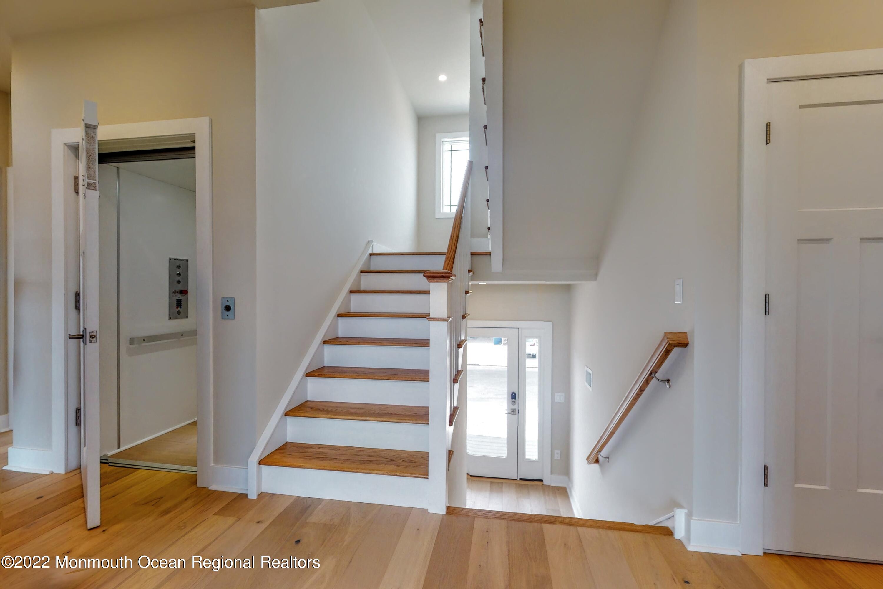 48 Muriel Drive Manahawkin, NJ 08050 - Photo 41 of 89 a view of entryway with wooden floor and stairs