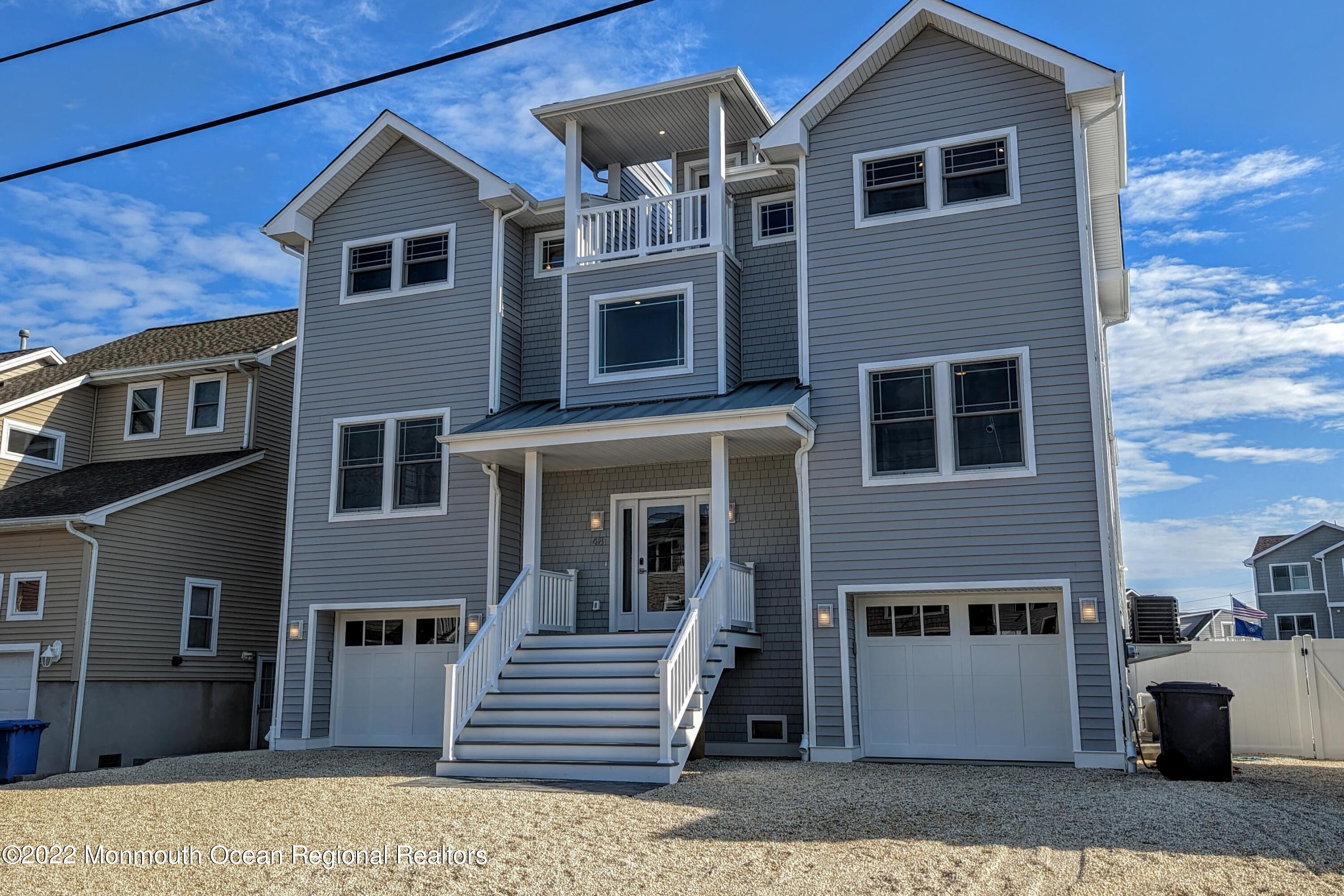 48 Muriel Drive Manahawkin, NJ 08050 - Photo 5 of 89 a front view of a house with a yard