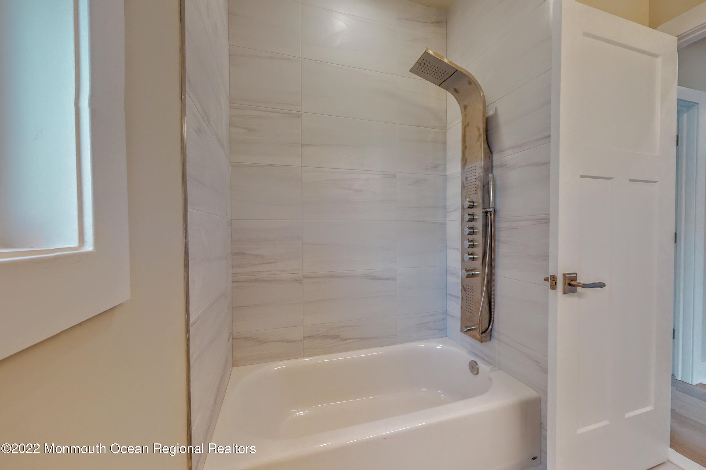 48 Muriel Drive Manahawkin, NJ 08050 - Photo 53 of 89 a bathroom with a bathtub