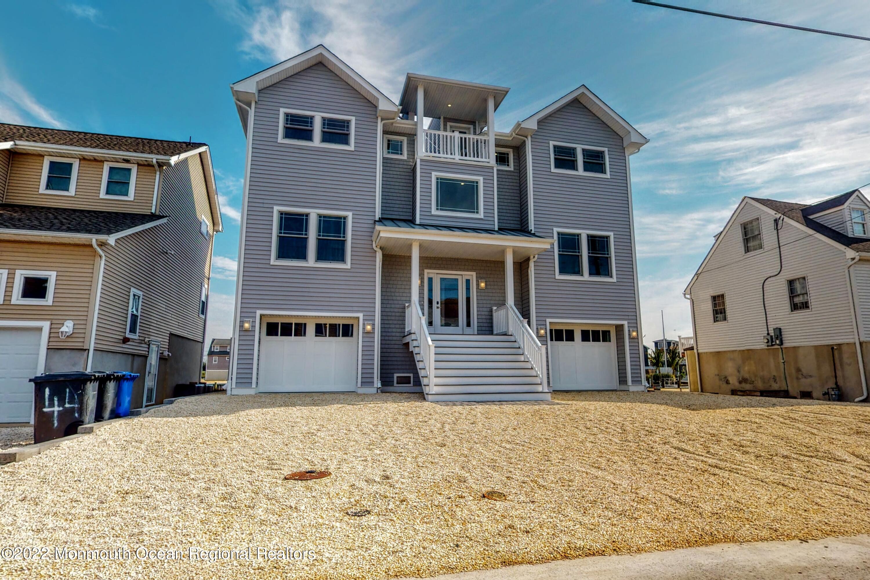48 Muriel Drive Manahawkin, NJ 08050 - Photo 6 of 89 a front view of a house with a yard