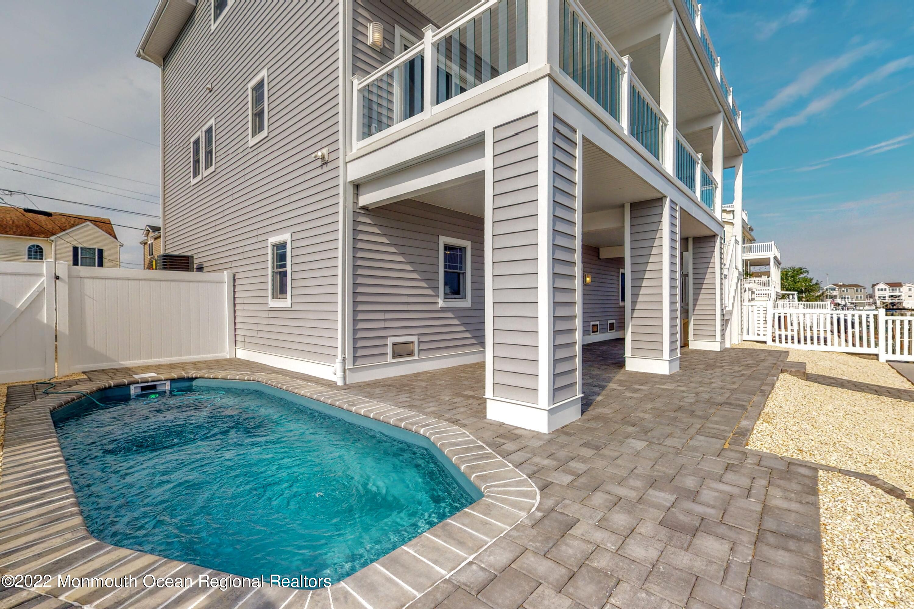 48 Muriel Drive Manahawkin, NJ 08050 - Photo 65 of 89 a view of a house with a yard