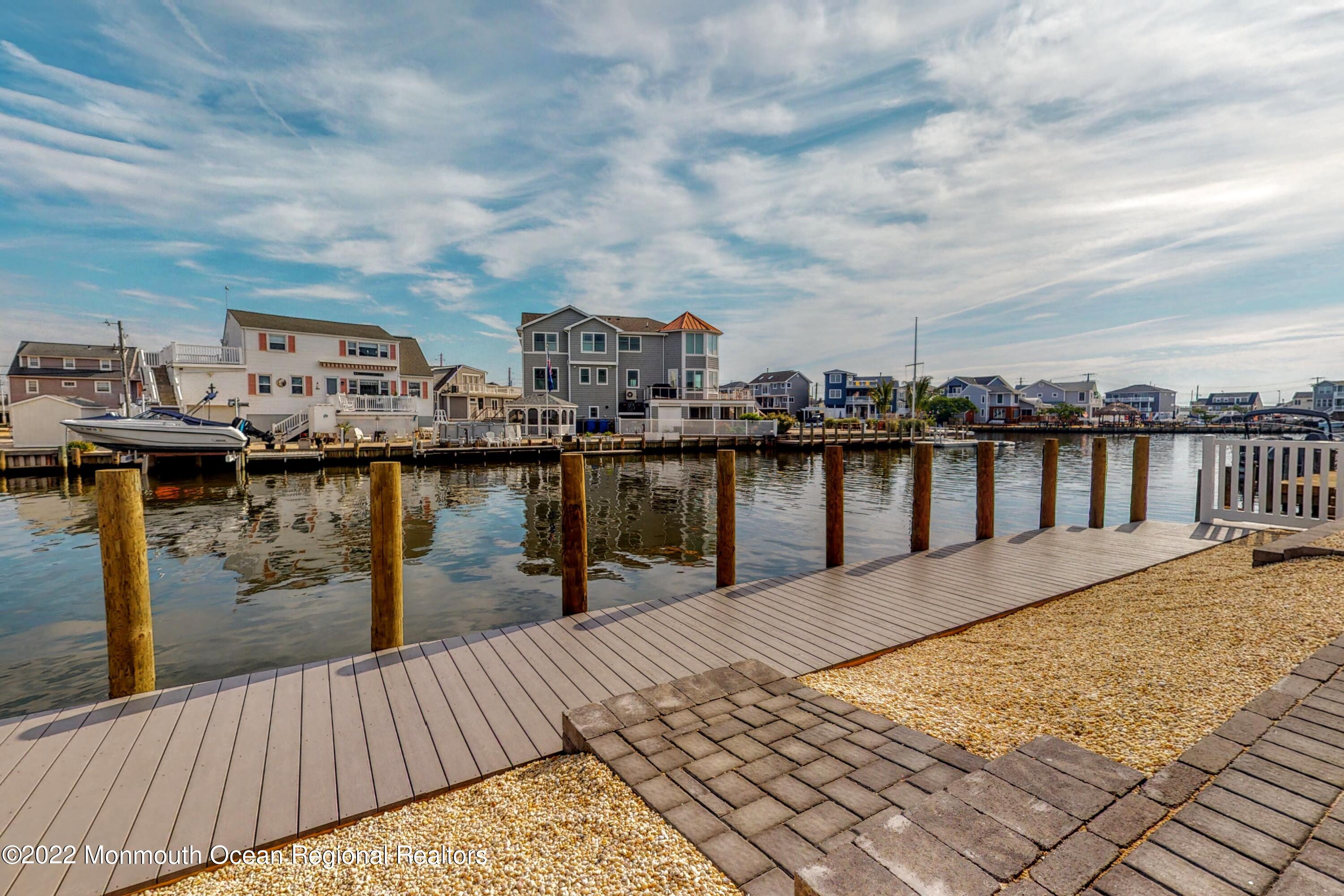 48 Muriel Drive Manahawkin, NJ 08050 - Photo 69 of 89 a view of a lake and city