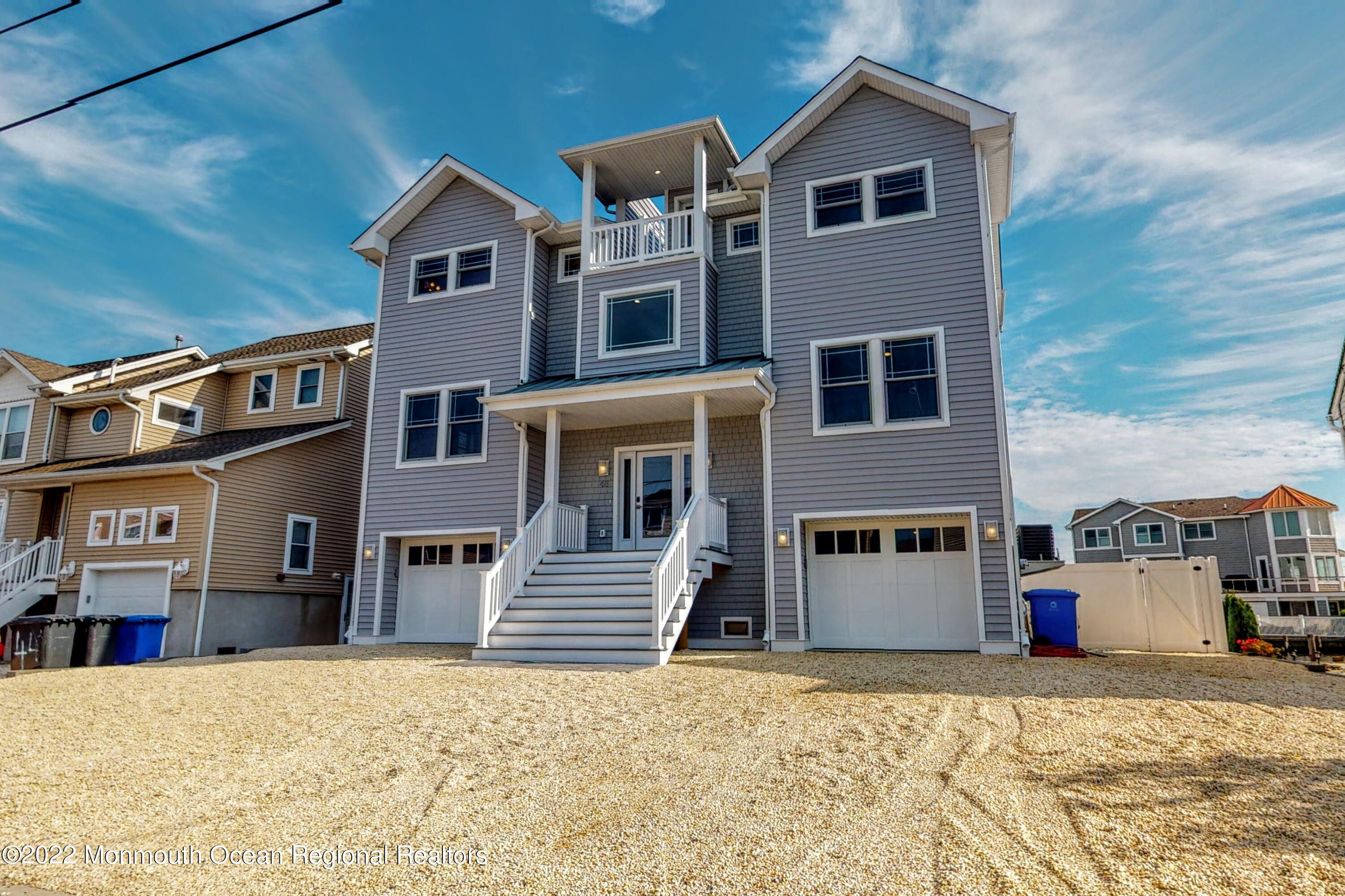 48 Muriel Drive Manahawkin, NJ 08050 - Photo 7 of 89 a view of a house with a snow in the background