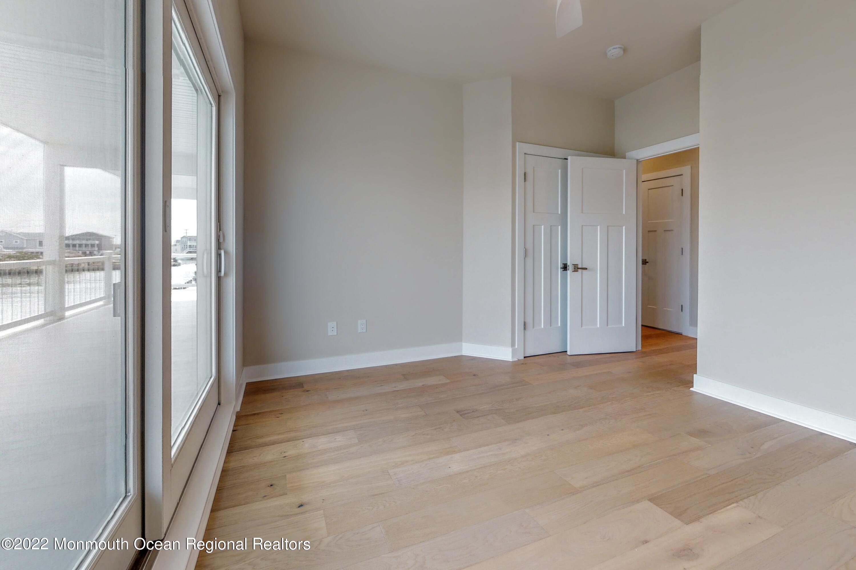 48 Muriel Drive Manahawkin, NJ 08050 - Photo 77 of 89 a view of an empty room and a window