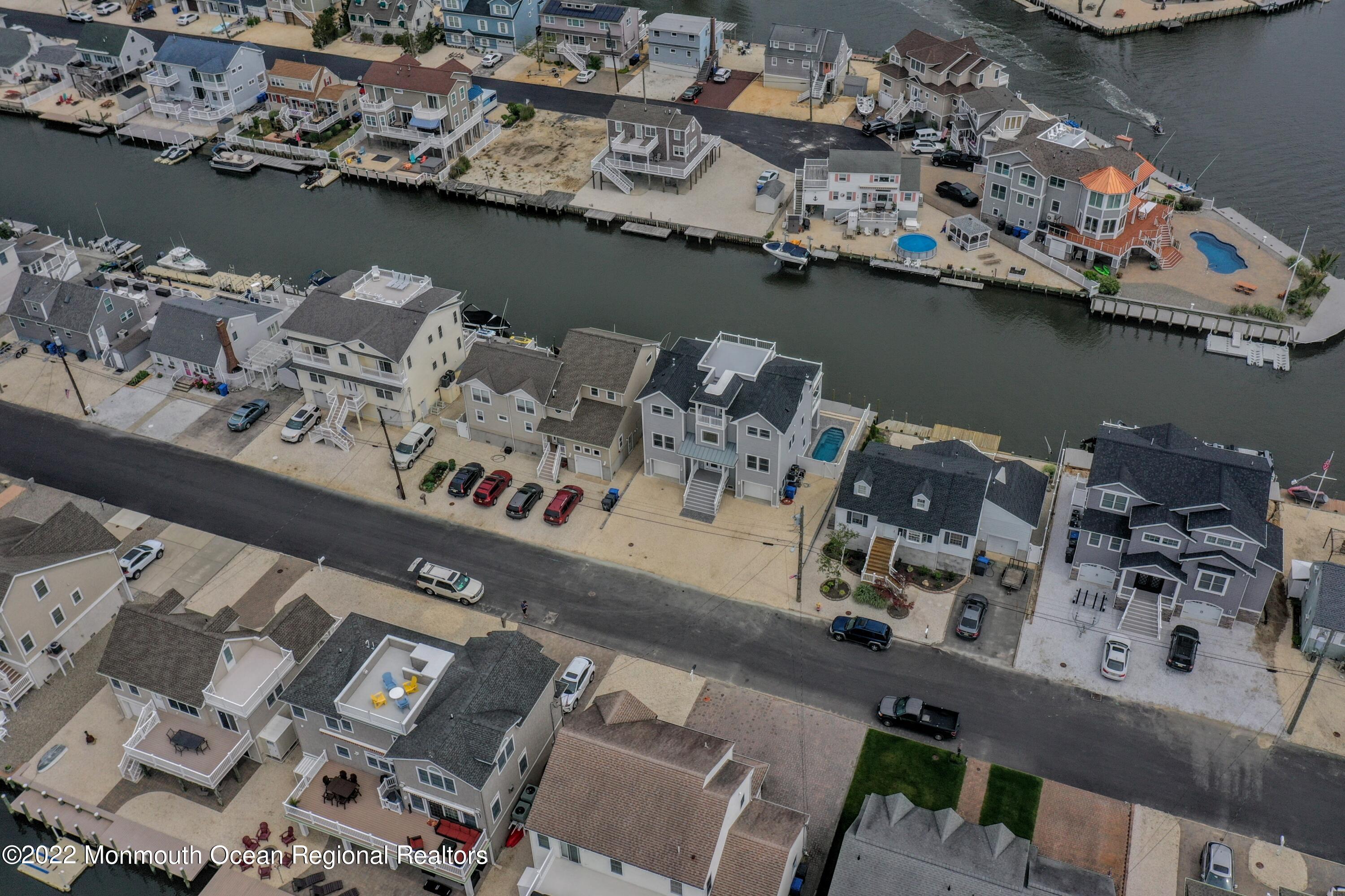 48 Muriel Drive Manahawkin, NJ 08050 - Photo 80 of 89 an aerial view of a house with a lake view