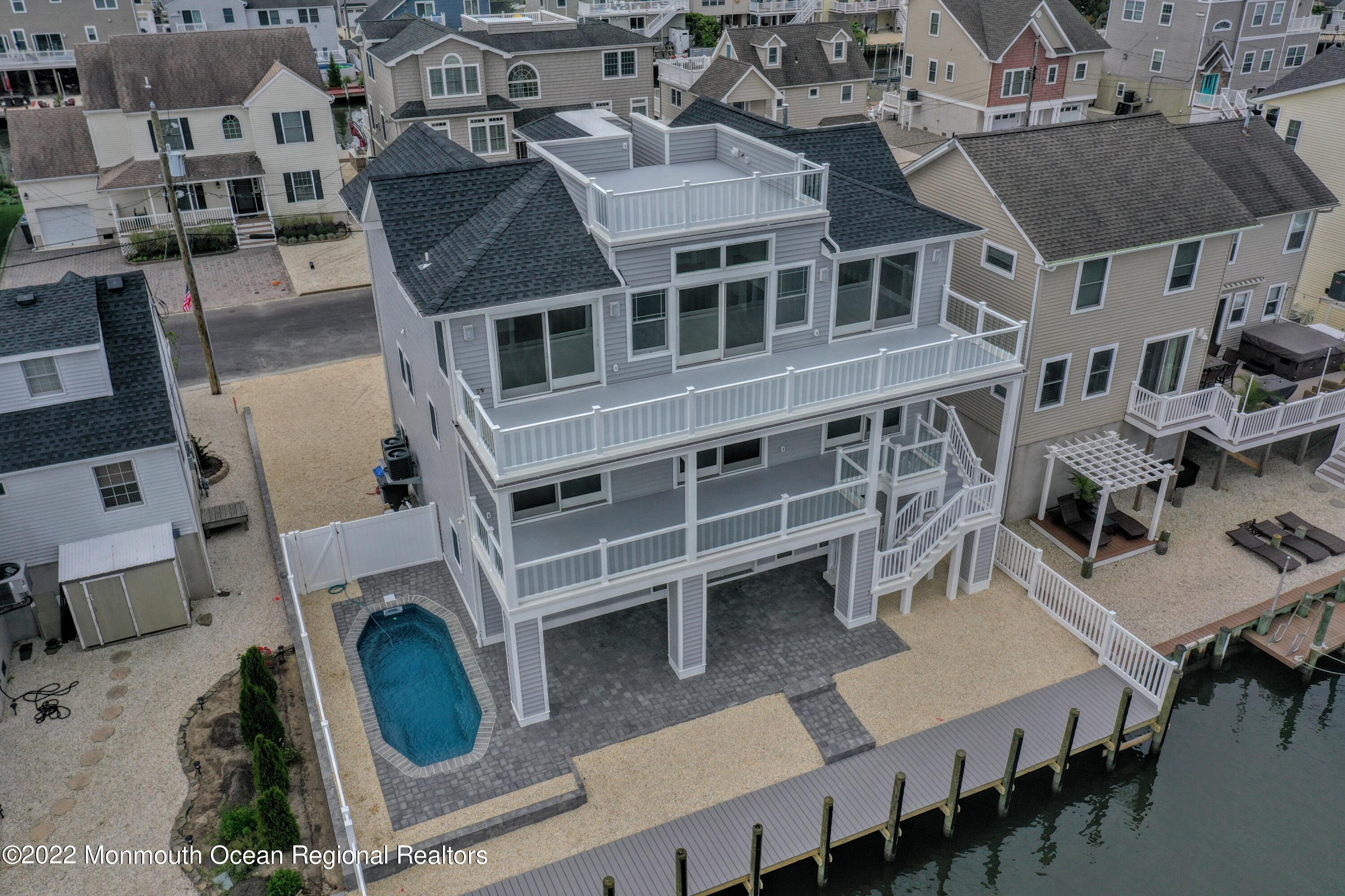 48 Muriel Drive Manahawkin, NJ 08050 - Photo 84 of 89 an aerial view of a house with roof deck