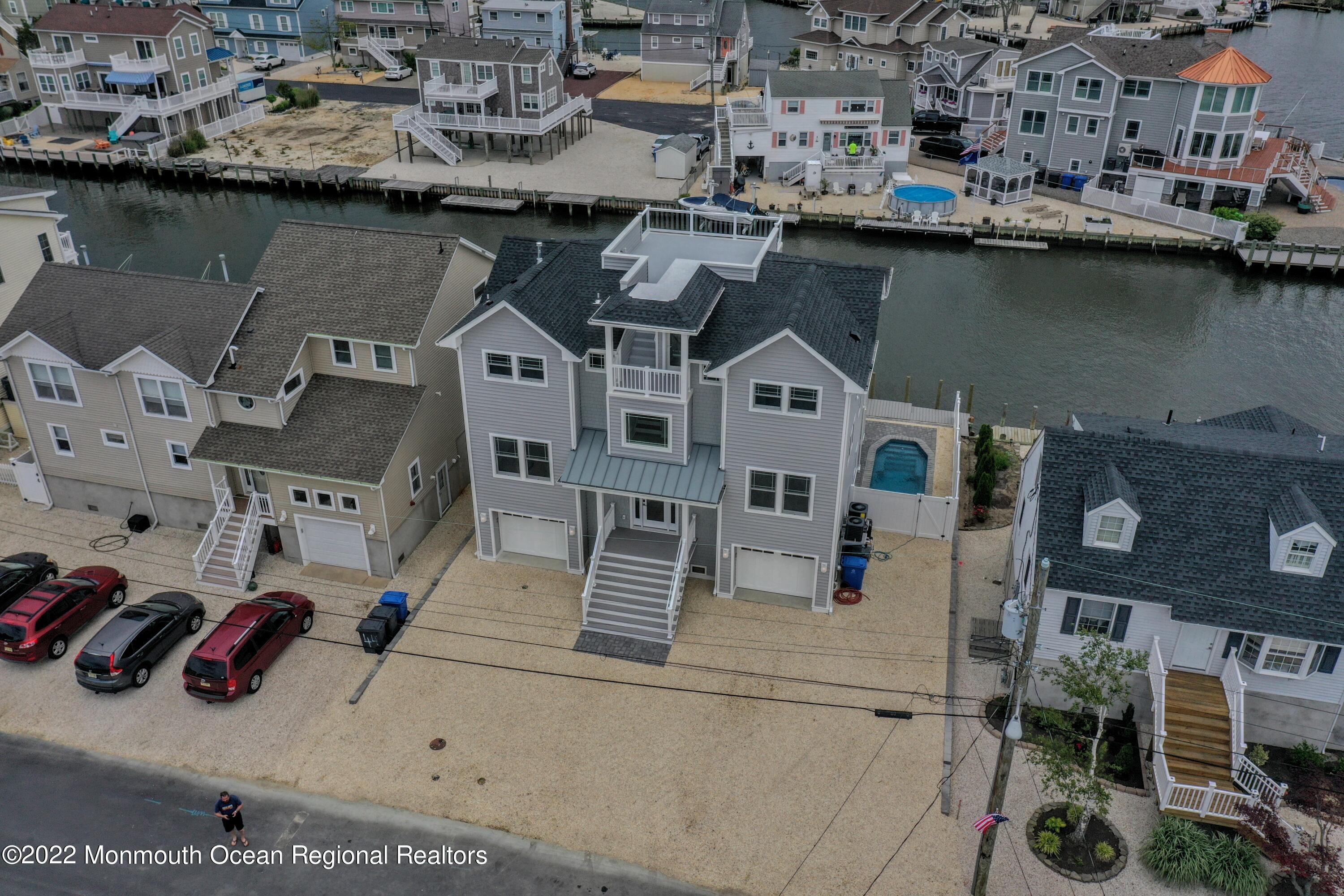 48 Muriel Drive Manahawkin, NJ 08050 - Photo 88 of 89 an aerial view of residential houses with outdoor space