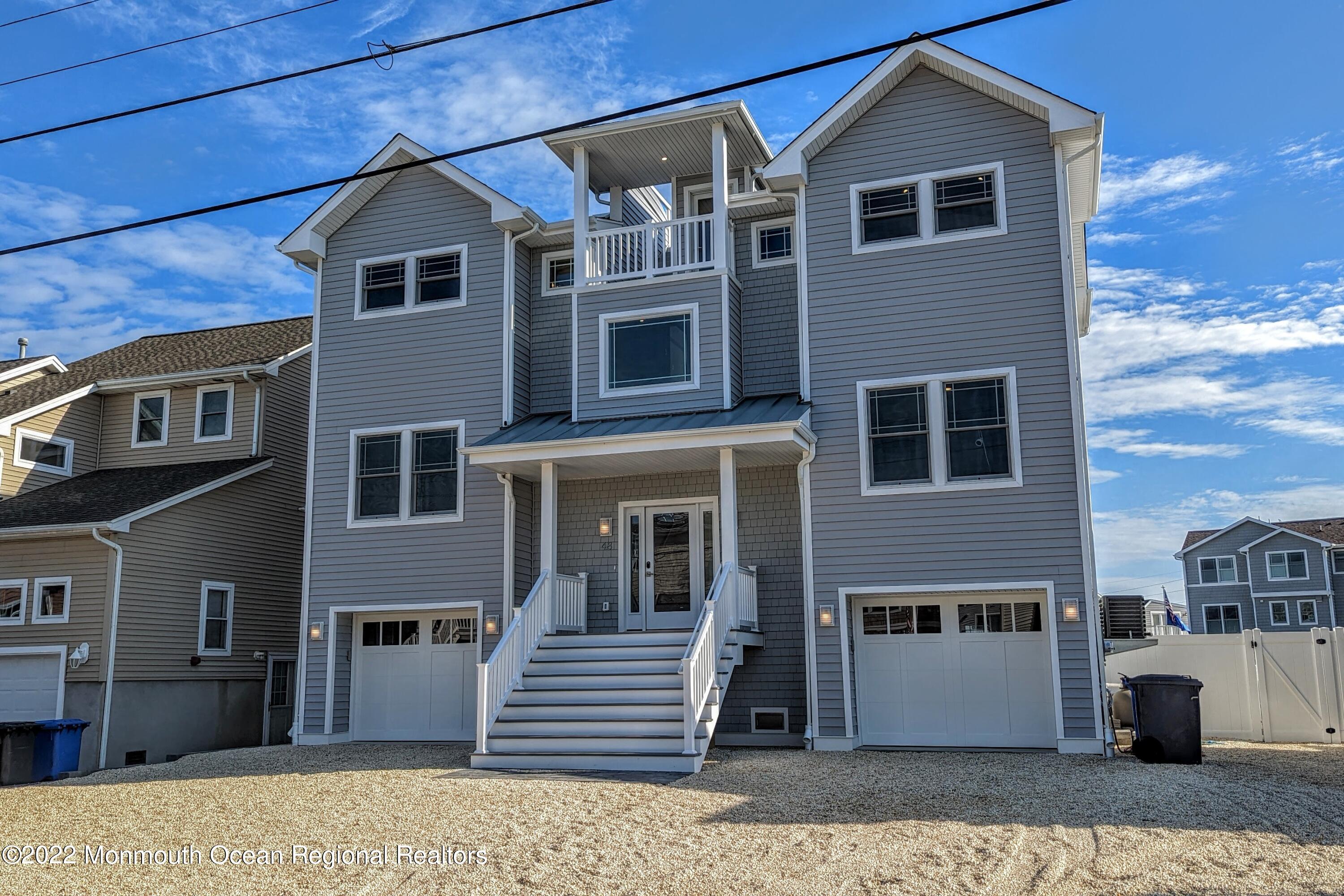 48 Muriel Drive Manahawkin, NJ 08050 - Photo 89 of 89 a front view of a house with a yard
